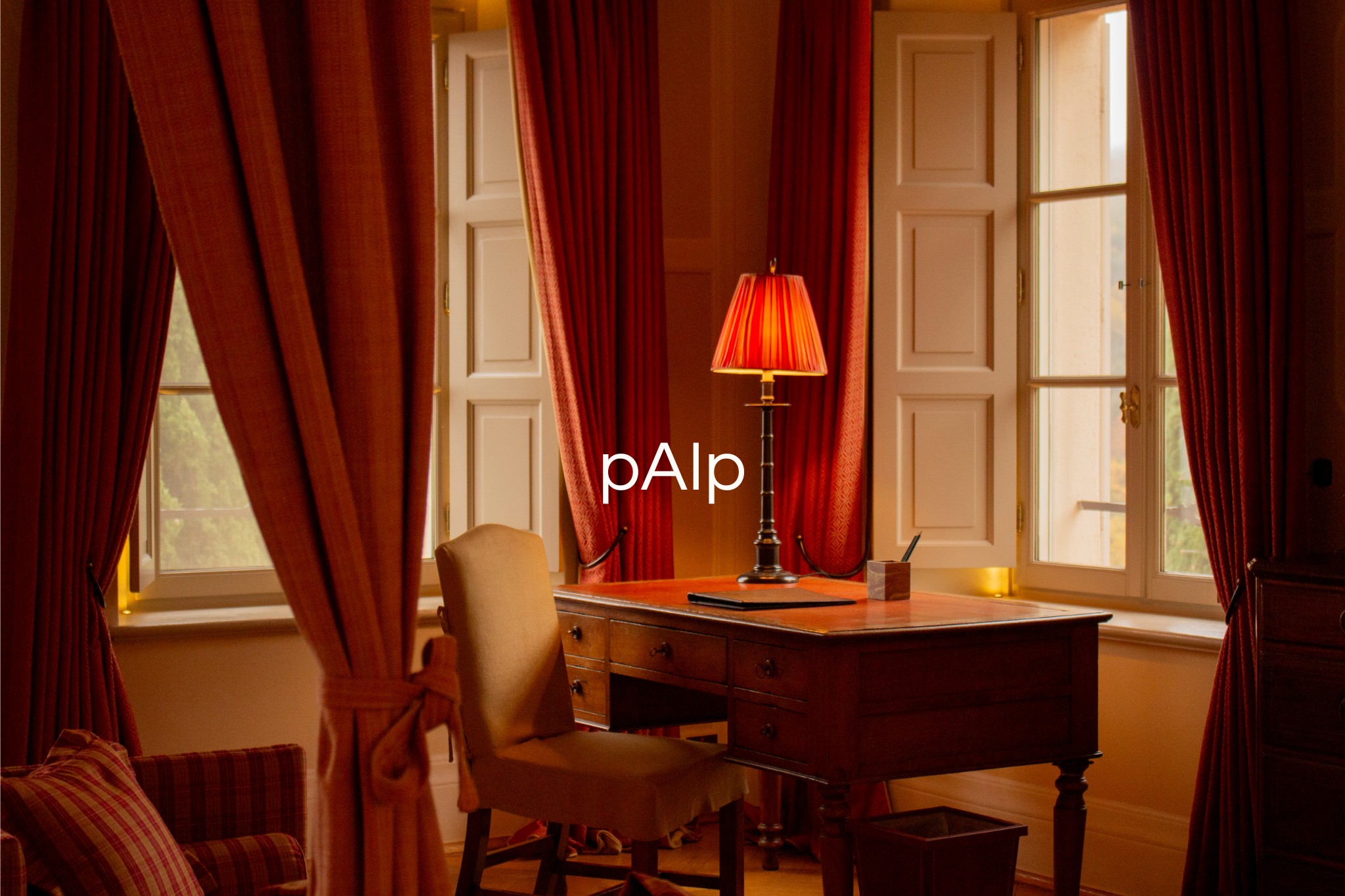 Woman in white dress and bucket hat walking down runway