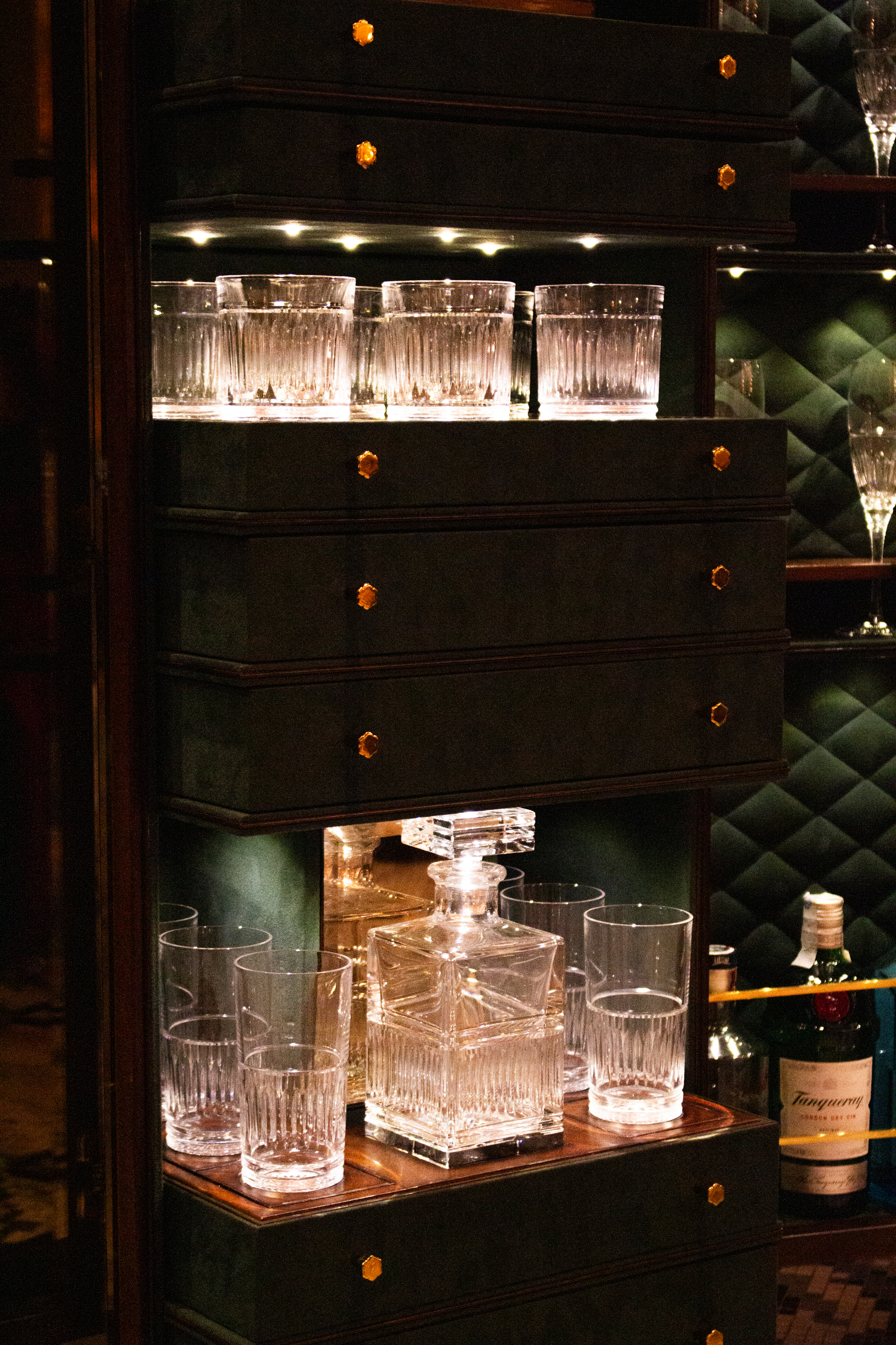 Woman with sunglasses walking down runway